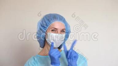女医生穿防护服：医用口罩，帽子和长袍.. 保护面部免受冠状病毒感染